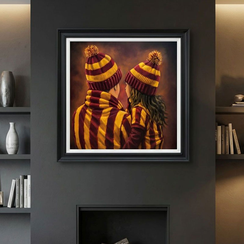 A framed example of one of the Emotions of Football paintings