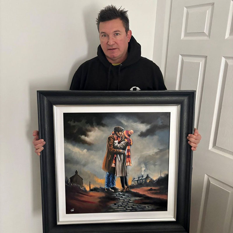 Paul holding on of the bespoke Emotions of Football paintings